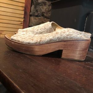 “Pony Hair” wooden sole slides.